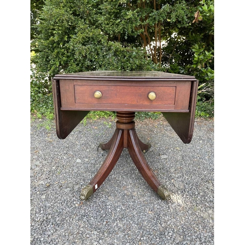 3067 - A Regency mahogany Pembroke table, fitted with a single end drawer, and raised on a turned central c... 