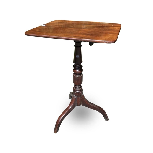 3069 - A George III mahogany pedestal occasional table, the rectangular top raised on a turned column and t... 