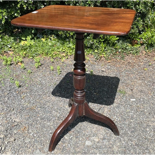 3069 - A George III mahogany pedestal occasional table, the rectangular top raised on a turned column and t... 