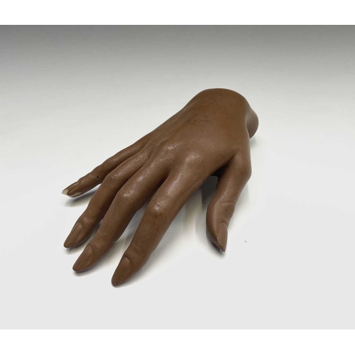 307 - Three assorted mannequin hands, the largest 21.5cm long.