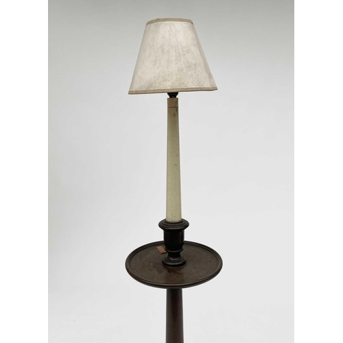 3072 - A mahogany standard lamp, 1920s, in the style of a Georgian candle stand, with white painted stem an... 