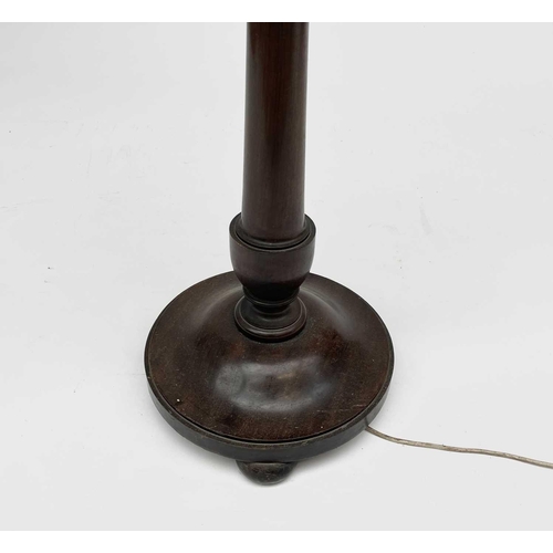 3072 - A mahogany standard lamp, 1920s, in the style of a Georgian candle stand, with white painted stem an... 