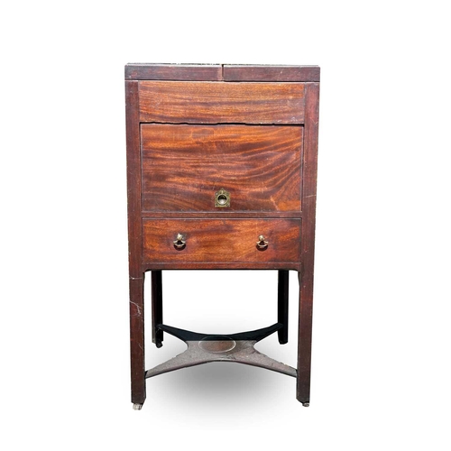 3074 - An early George III mahogany washstand, the divided folding top opening to reveal spaces for a wash ... 