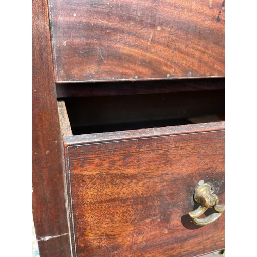 3074 - An early George III mahogany washstand, the divided folding top opening to reveal spaces for a wash ... 