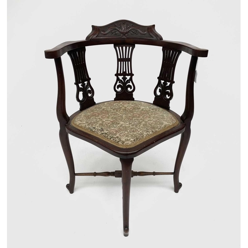 3075 - An Edwardian mahogany corner chair, with triple pierced and carved splats, on cabriole legs, height ... 