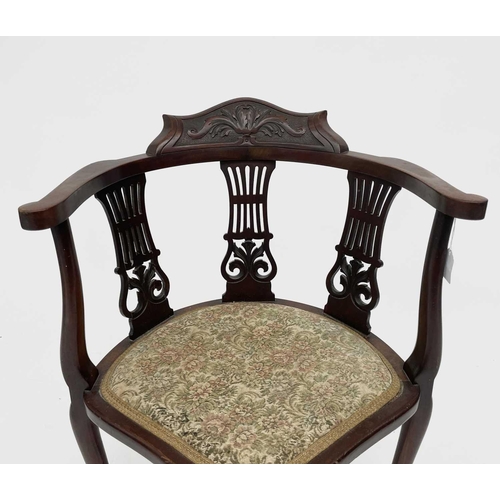 3075 - An Edwardian mahogany corner chair, with triple pierced and carved splats, on cabriole legs, height ... 