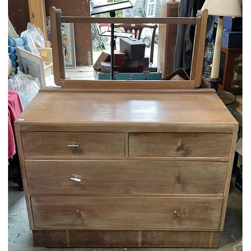 3081 - A 1930s/40s limed oak dressing table with adjustable mirror, fitted two short and two long drawers, ... 