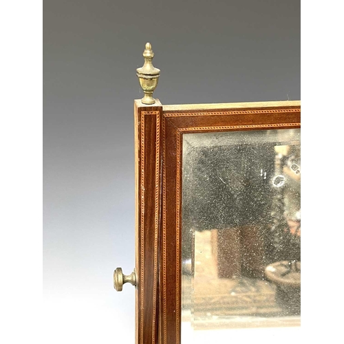 3085 - A George III coromandel oval swing toilet mirror, the base fitted with three drawers, height 59cm, w... 