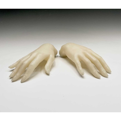 309 - Two mannequin hands. Length 22cm.