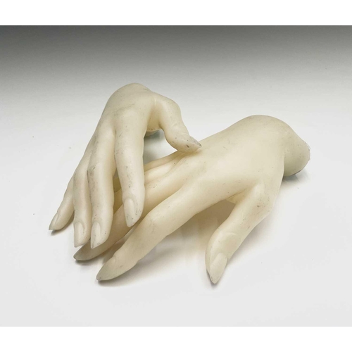 309 - Two mannequin hands. Length 22cm.