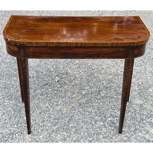 3091 - A late George III mahogany and crossbanded fold top card table, raised on square taper legs, height ... 