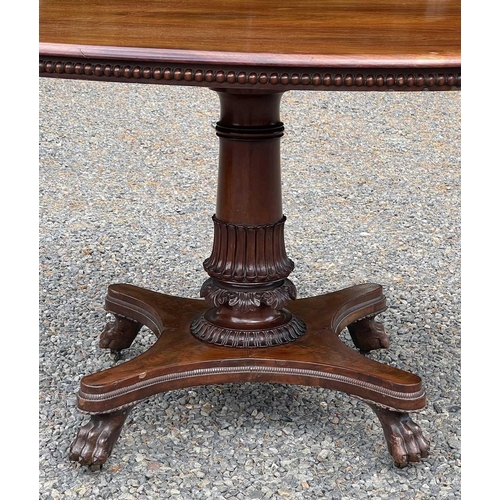 3092 - An early Victorian mahogany oval supper table, the top with beaded edge and raised on a turned and l... 