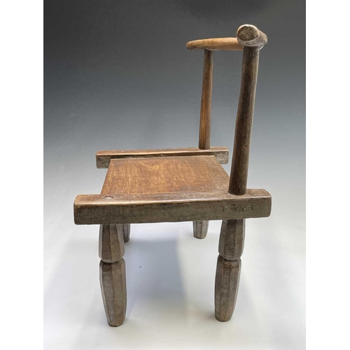 3095 - A late 19th/ early 20th century primitive chair, Ivory Coast, Dan Tribe, height 55cm.