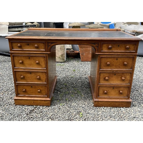 3097 - A Victorian oak desk, stamped Taylor, Fisher & Blunt, 110 Fenchurch St, London, with eight pedestal ... 