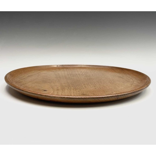 3099 - A Robin Nance turned circular sycamore tray, with raised edge, diameter 40.5cm.