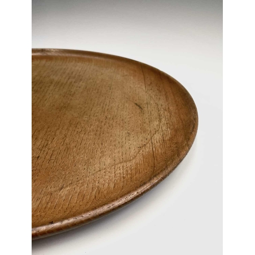 3099 - A Robin Nance turned circular sycamore tray, with raised edge, diameter 40.5cm.