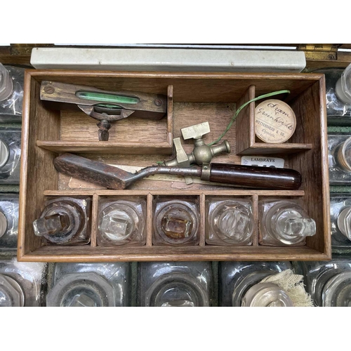 31 - A Victorian oak cased family medicine chest, fitted with an assortment of glass jars and stoppers, l... 