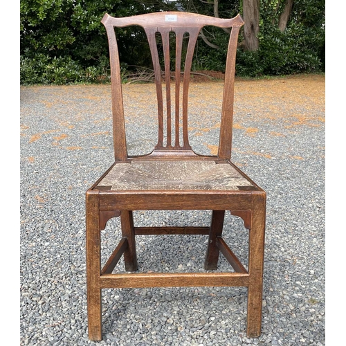 3102 - A country made elm side chair, early 19th century, with pierced splat and drop-in rush seat, Provena... 