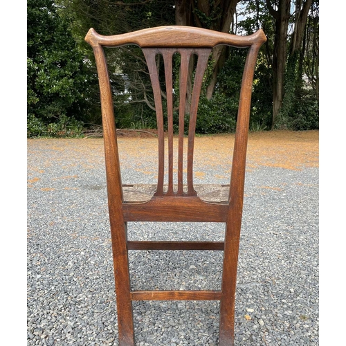 3102 - A country made elm side chair, early 19th century, with pierced splat and drop-in rush seat, Provena... 