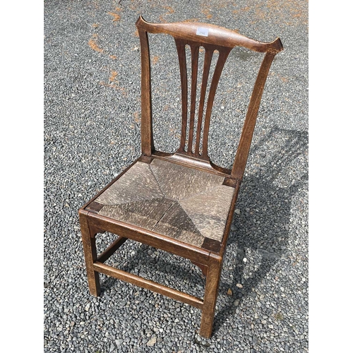 3102 - A country made elm side chair, early 19th century, with pierced splat and drop-in rush seat, Provena... 