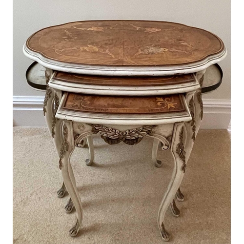 3106 - A nest of three French walnut, kingwood and marquetry occasional tables, circa 1920, the largest wit... 