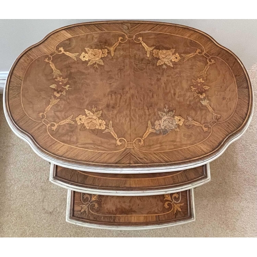 3106 - A nest of three French walnut, kingwood and marquetry occasional tables, circa 1920, the largest wit... 