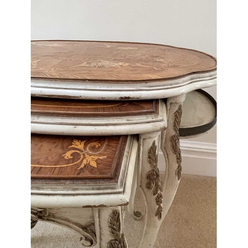 3106 - A nest of three French walnut, kingwood and marquetry occasional tables, circa 1920, the largest wit... 