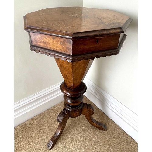 3108 - A Victorian walnut and inlaid octagonal work table, with fitted interior and raised on a carved trip... 