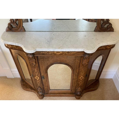 3109 - A Victorian walnut chiffonier with shaped carved frame mirror back above a white marbled top and fit... 