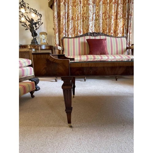 3114 - A mahogany and crossbanded coffee table, 20th century, with inset leather skiver, raised on squared ... 