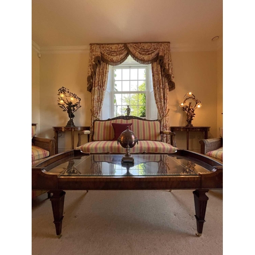 3114 - A mahogany and crossbanded coffee table, 20th century, with inset leather skiver, raised on squared ... 