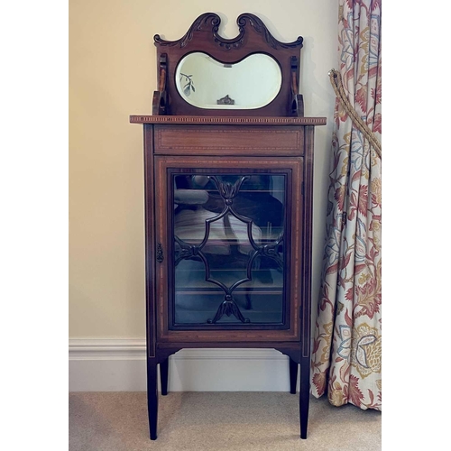 3115 - An Edwardian mahogany and satinwood banded music cabinet, with raised mirrored back above a glazed d... 