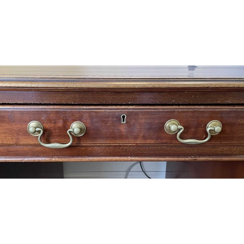 3117 - An Edwardian mahogany twin pedestal writing desk, with tooled leather skiver, and fitted with an arr... 