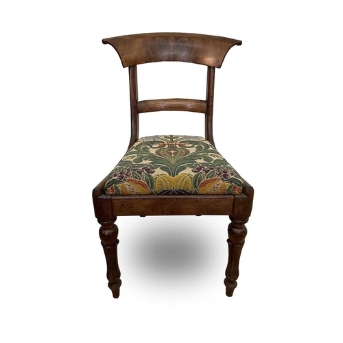 3118 - A William IV mahogany bar back dining chair on turned and fluted front legs.