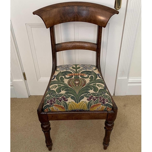 3118 - A William IV mahogany bar back dining chair on turned and fluted front legs.