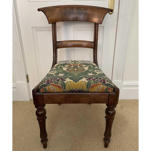 3118 - A William IV mahogany bar back dining chair on turned and fluted front legs.