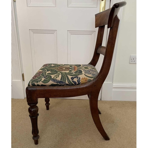 3118 - A William IV mahogany bar back dining chair on turned and fluted front legs.