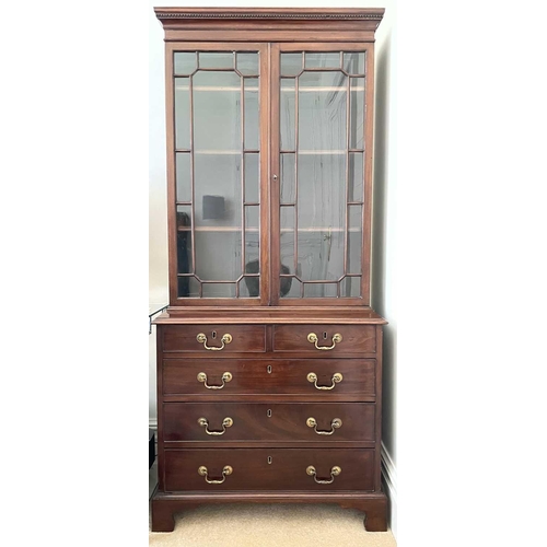 3119 - A mahogany bookcase cabinet, the upper part with glazed door enclosing three adjustable shelves, the... 