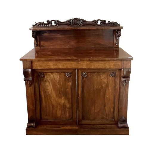 3122 - A Victorian rosewood chiffonier with raised back and fitted a long drawer and two doors on a plinth ... 