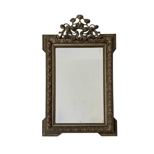 3124 - A Continental gilt framed wall mirror, circa 1900, with pierced foliate Art Nouveau style cresting a... 