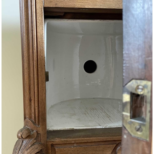 3133 - A French walnut bedside cupboard, late 19th century, with inset marble top above a drawer and cupboa... 