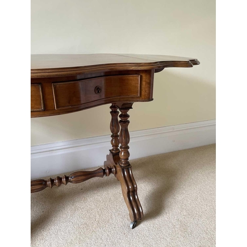 3135 - A French walnut serpentine shaped sofa table, circa 1880, fitted with two drawers and raised on turn... 