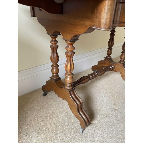 3135 - A French walnut serpentine shaped sofa table, circa 1880, fitted with two drawers and raised on turn... 