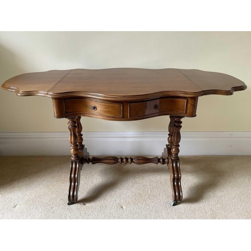 3135 - A French walnut serpentine shaped sofa table, circa 1880, fitted with two drawers and raised on turn... 