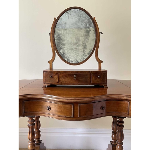 3136 - A George III mahogany and rosewood banded dressing table mirror, the bow front base fitted three dra... 