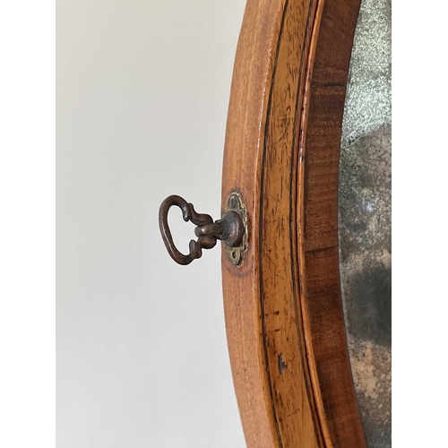 3136 - A George III mahogany and rosewood banded dressing table mirror, the bow front base fitted three dra... 