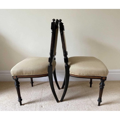 3137 - A pair of Victorian aesthetic movement ebonised and burr walnut side chairs, with padded backs and s... 