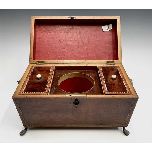 314 - A George III mahogany, inlaid and chequer strung tea caddy, with fitted interior and brass lion mask... 