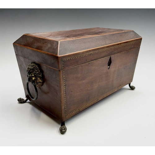 314 - A George III mahogany, inlaid and chequer strung tea caddy, with fitted interior and brass lion mask... 