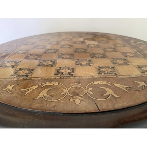 3147 - A Victorian walnut and inlaid sewing table, the circular top raised on a tapered and carved column a... 